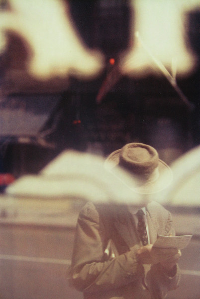 Saul Leiter - Man Reading, 1957, Chromogenic print, printed later, 35 x 28 cm