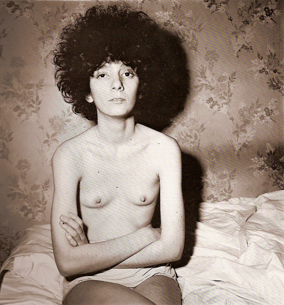 Diane Arbus - Girl sitting on her bed with her shirt off, N.Y.C, 1968